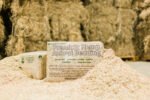 Farmer direct hemp animal bedding bag in agricultural barn with straw bales